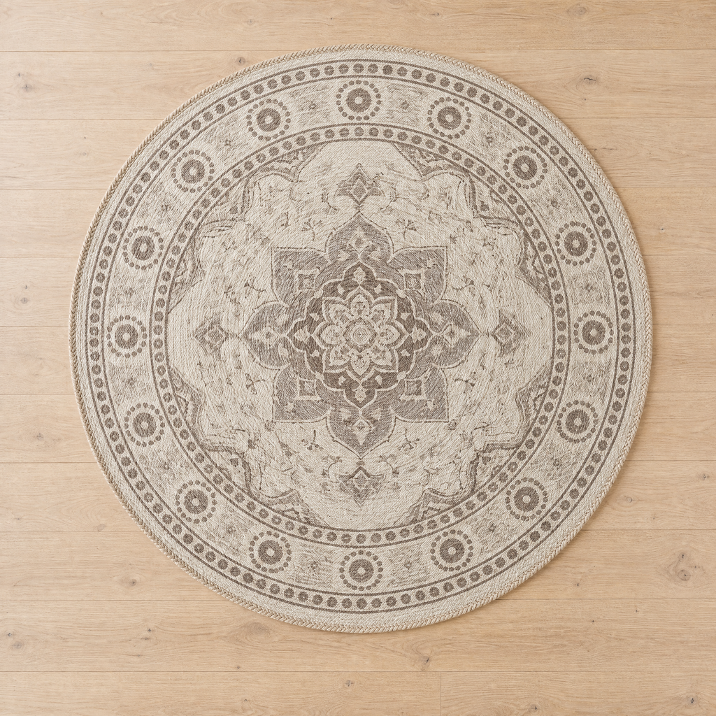 Overhead flat-lay of Round Rug Roman showing its full beige and taupe medallion pattern