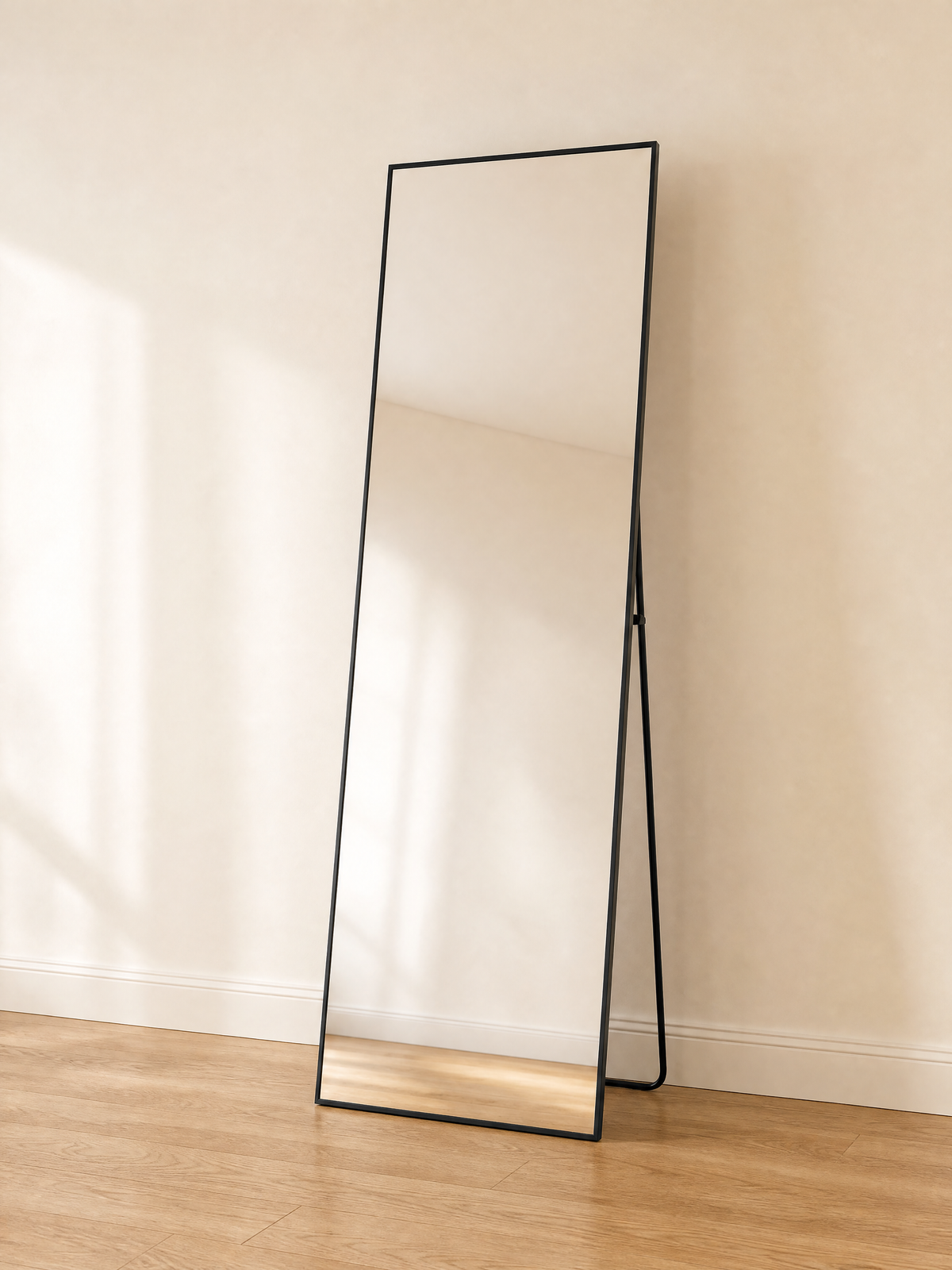 Mirror Peter full-length leaning mirror with thin black frame, three-quarter view