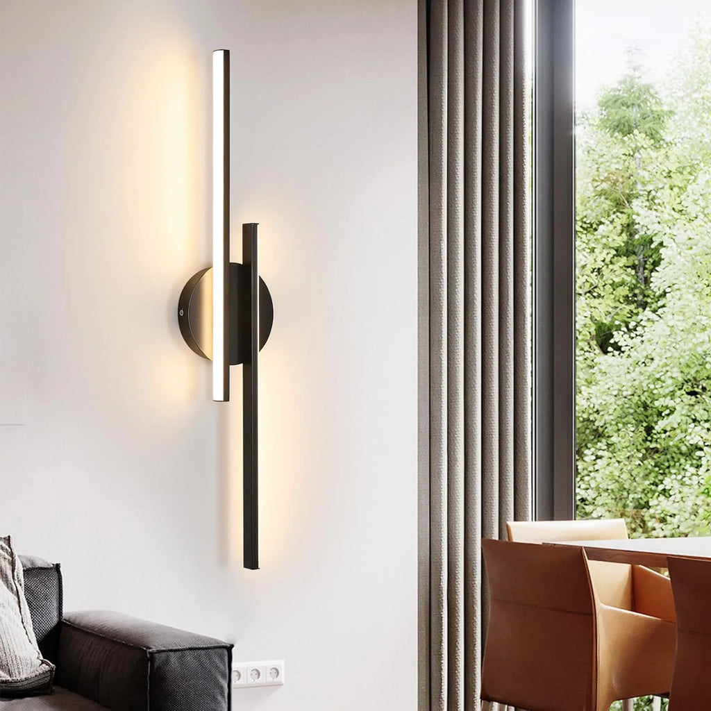 Wall Sconce Richard beside a window in a living room