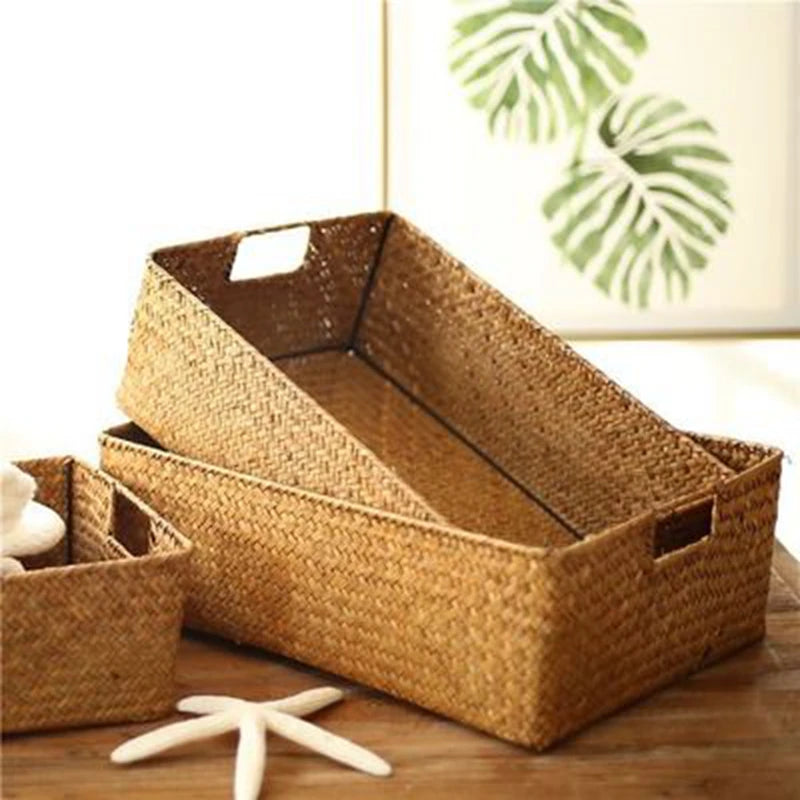 Seagrass storage baskets in different sizes on a wooden table