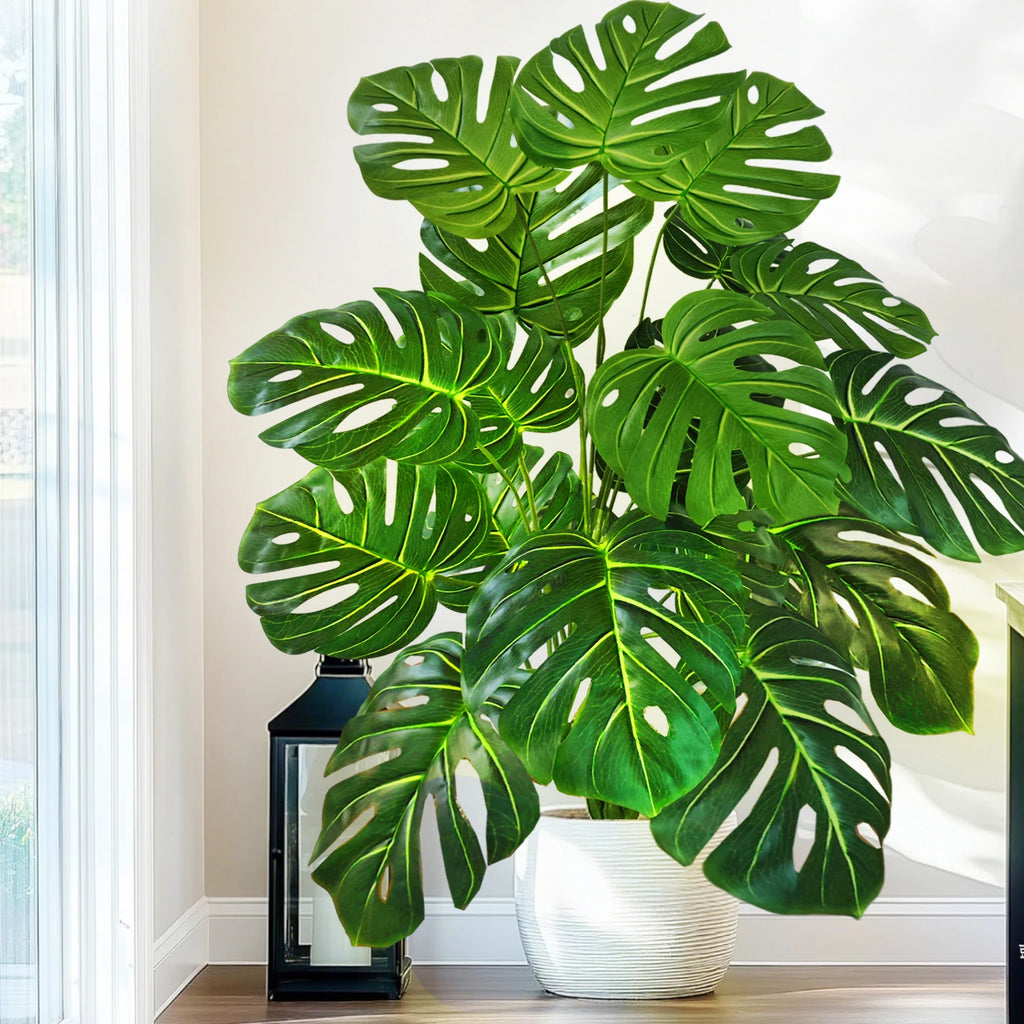 Artificial monstera Blanka in fresh green in a white planter