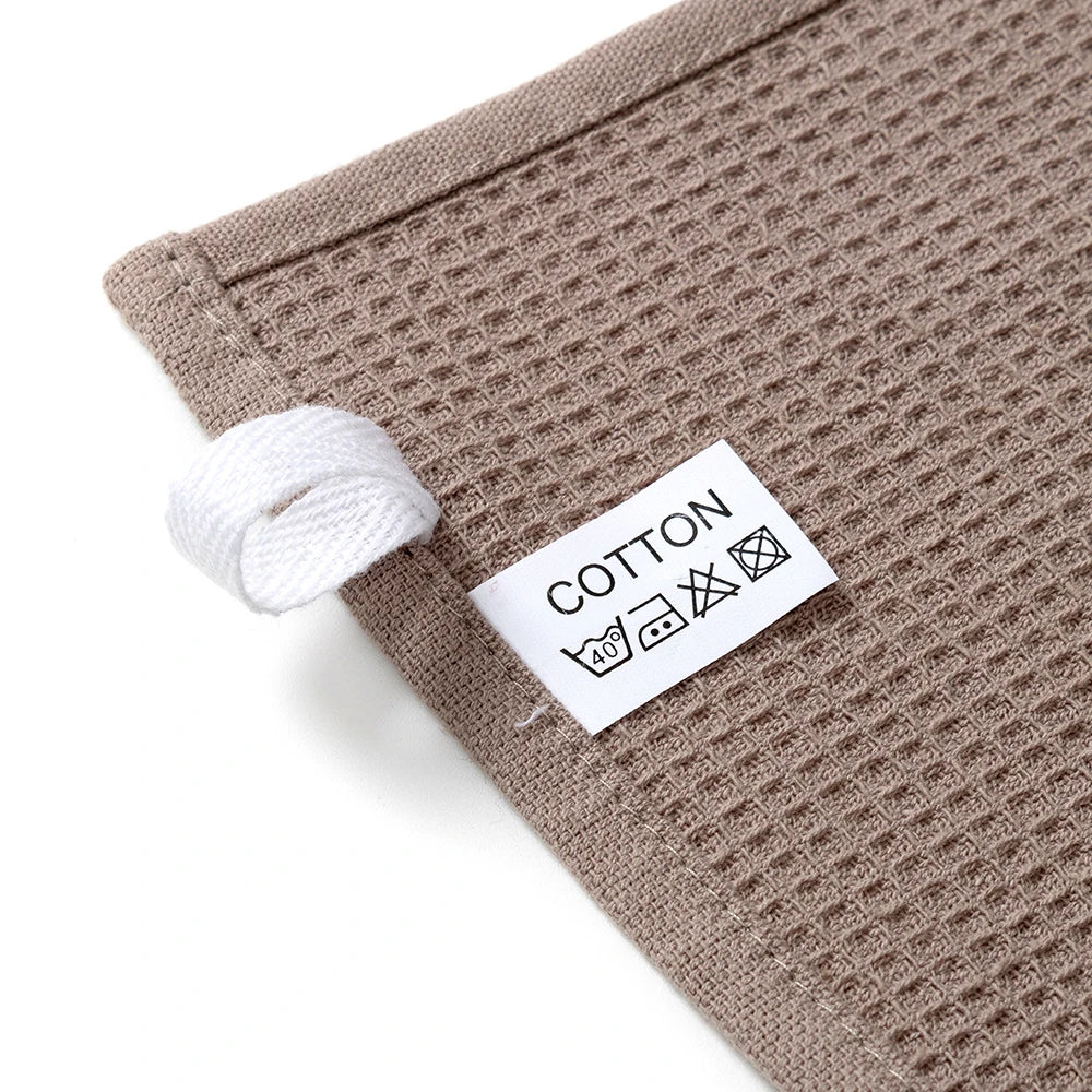 Close-up of the waffle weave and cotton label of Kitchen Towels Vlasta