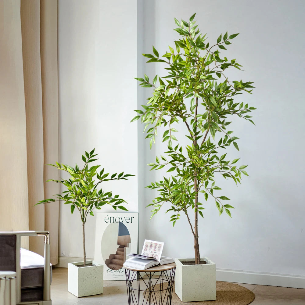 Two faux nandina stems of different heights in square planters