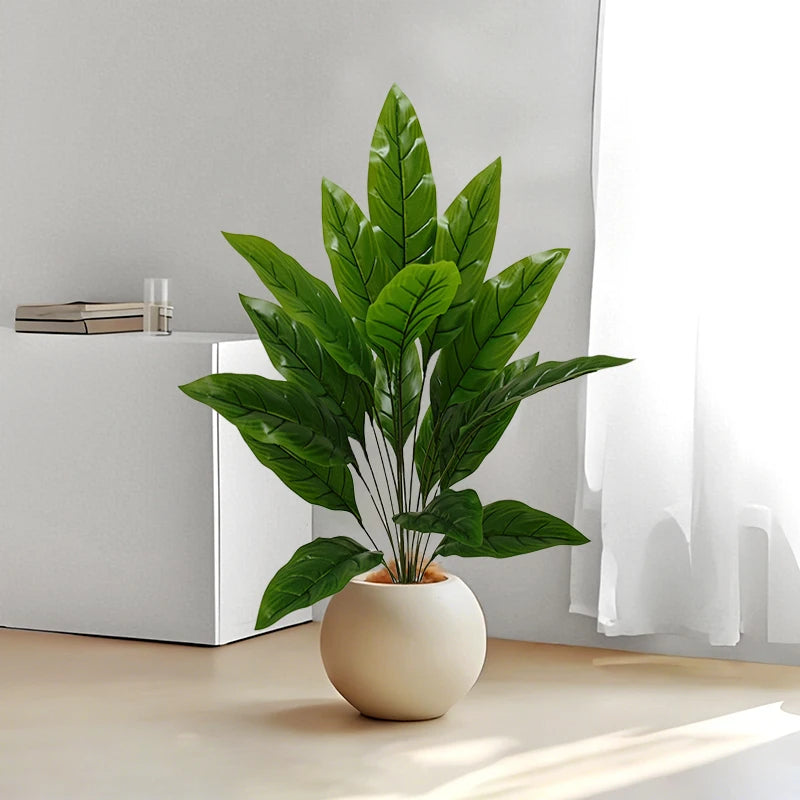 Artificial plant Andrea in a round white pot on the floor