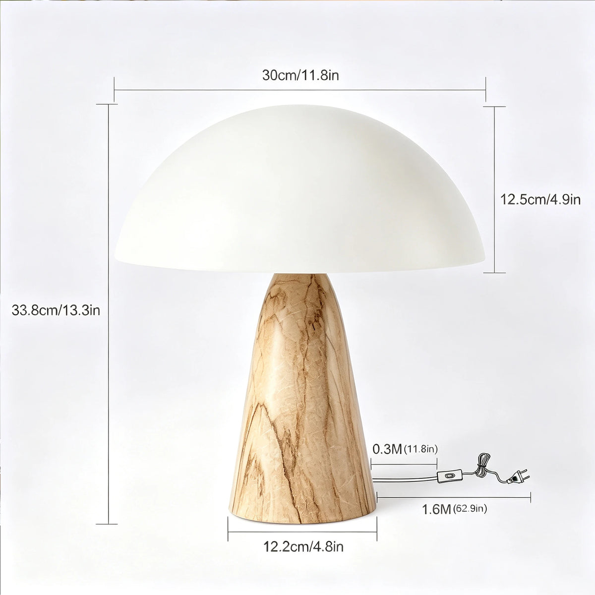 Table Lamp Boris in Sand, dome shade lit against a light marble-effect base