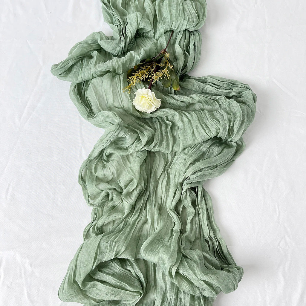 Sage semi-sheer gauze table runner, crinkled texture