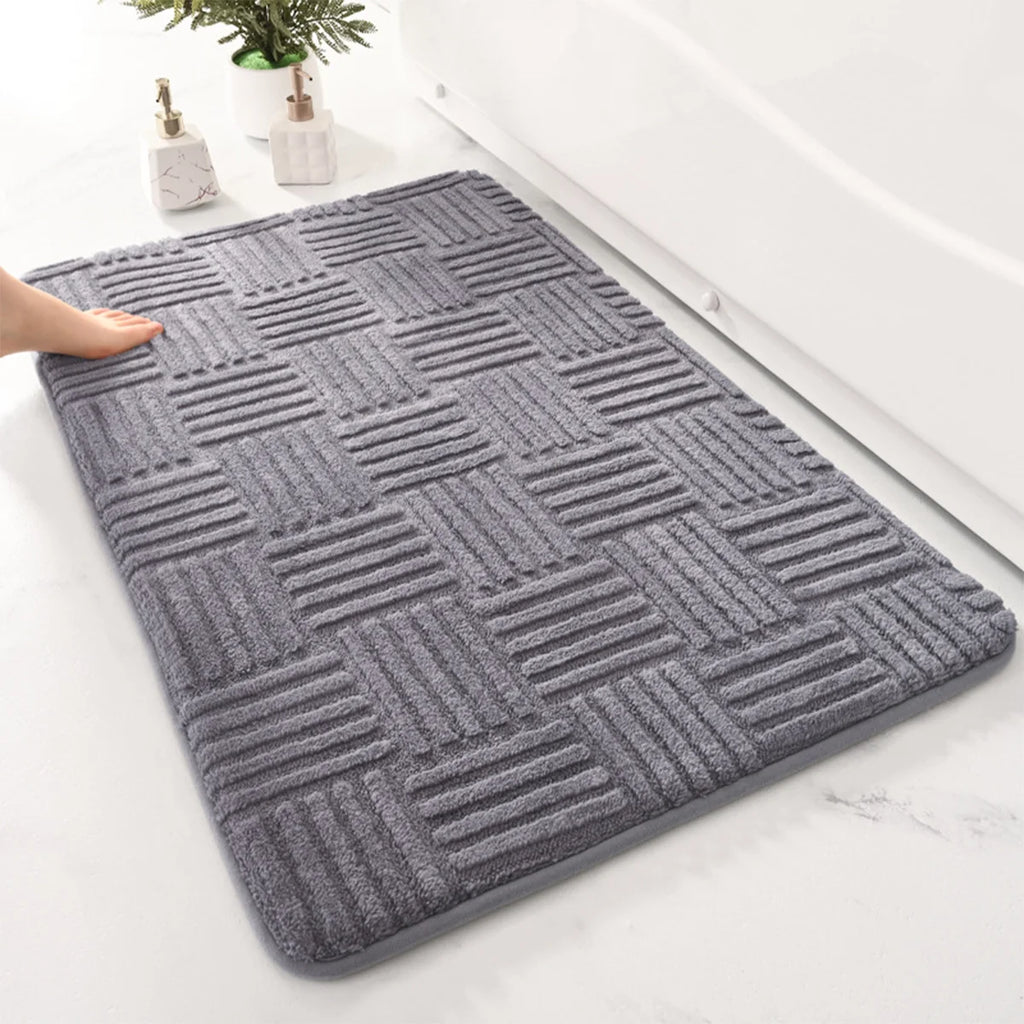 Bath Mat Silvia in dark grey with a raised woven pattern