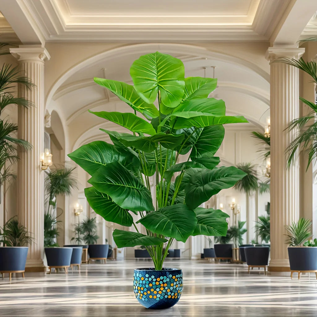 Faux tropical plant with 18 leaves in a grand entrance hall (pot not included)