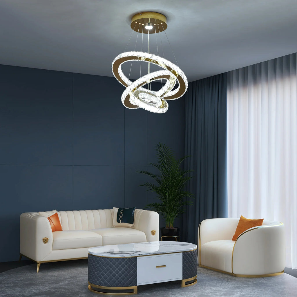 Chandelier Soňa hanging above a coffee table
