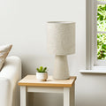 Table Lamp Marek styled in a warm neutral living room beside a window