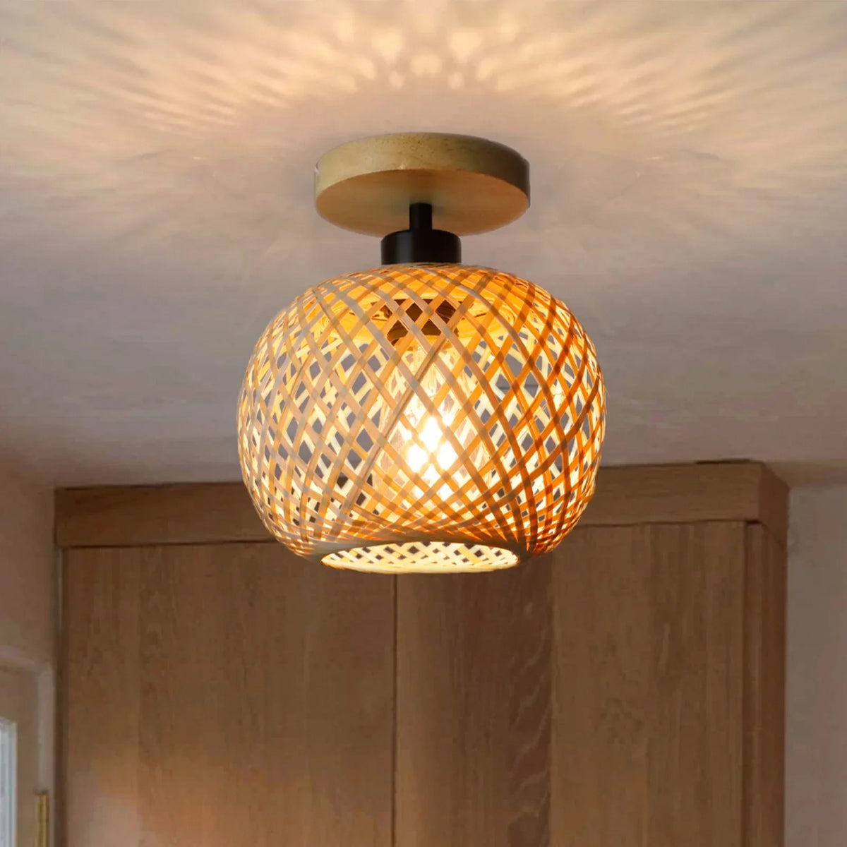 Pendant Lamp Rudolf, woven bamboo shade as a flush ceiling light casting patterned shadows