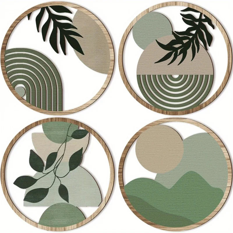 Four round wooden wall pieces in sage green and sand
