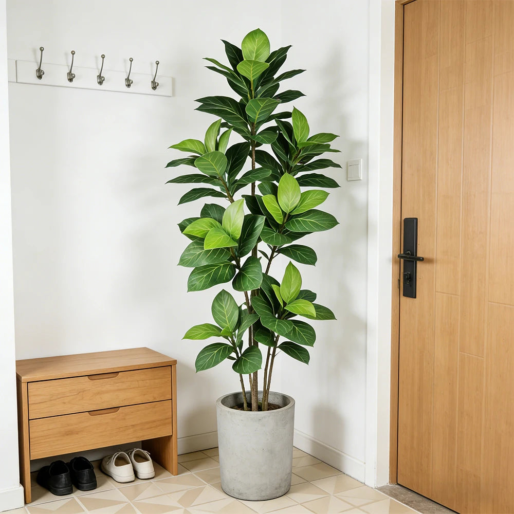 Faux ficus stem Brigita in a concrete planter in a calm entryway