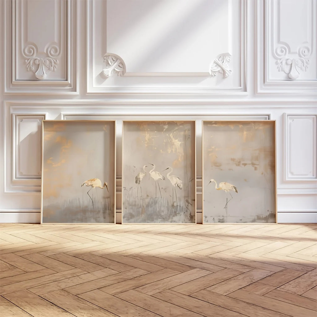 Wall Art Ingrida – set of 3 crane prints leaning on a panelled wall