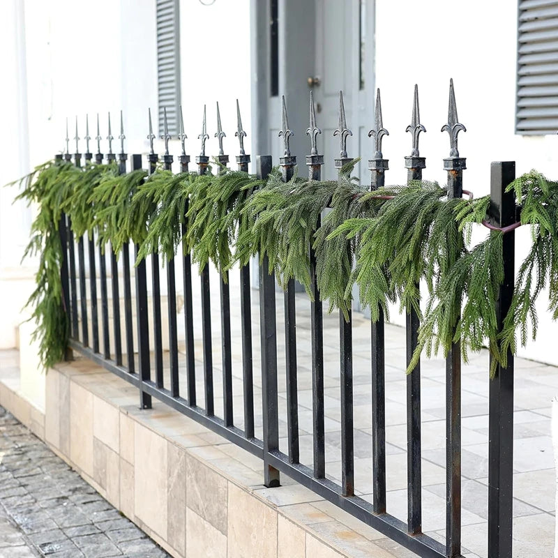 Pine Garland Viktória – garland on an outdoor railing