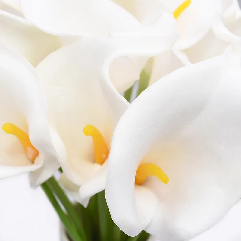 Close-up of white real-touch calla lily heads