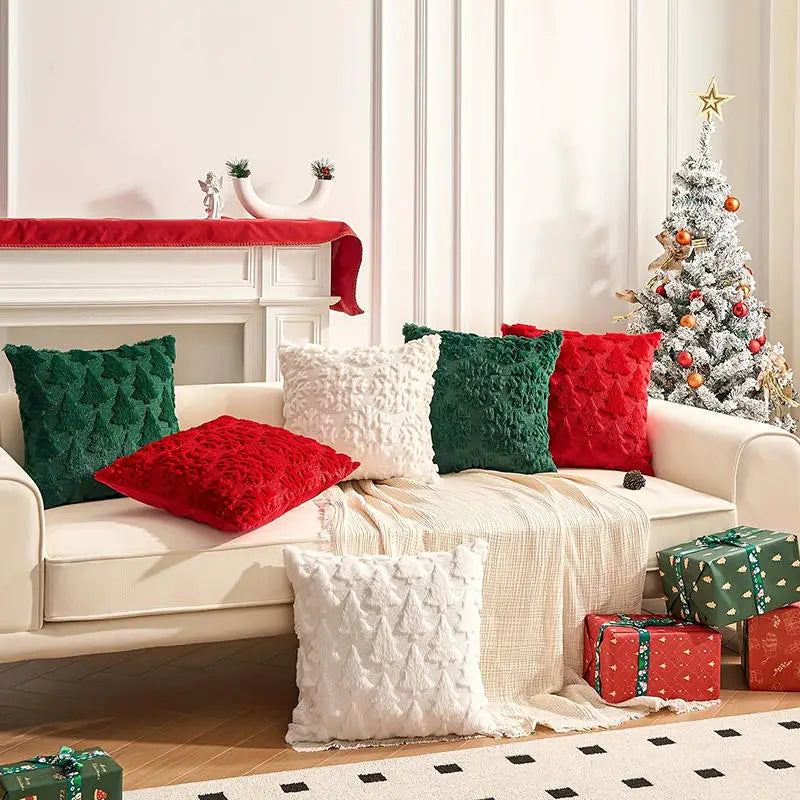 Cushion Cover Natálka in red, green and white on a cream sofa at Christmas