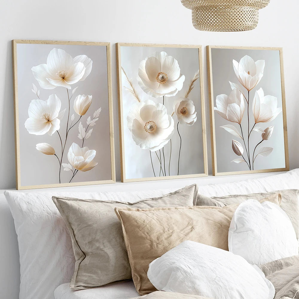 Wall Art Patrícia – three white blossom prints above a bed