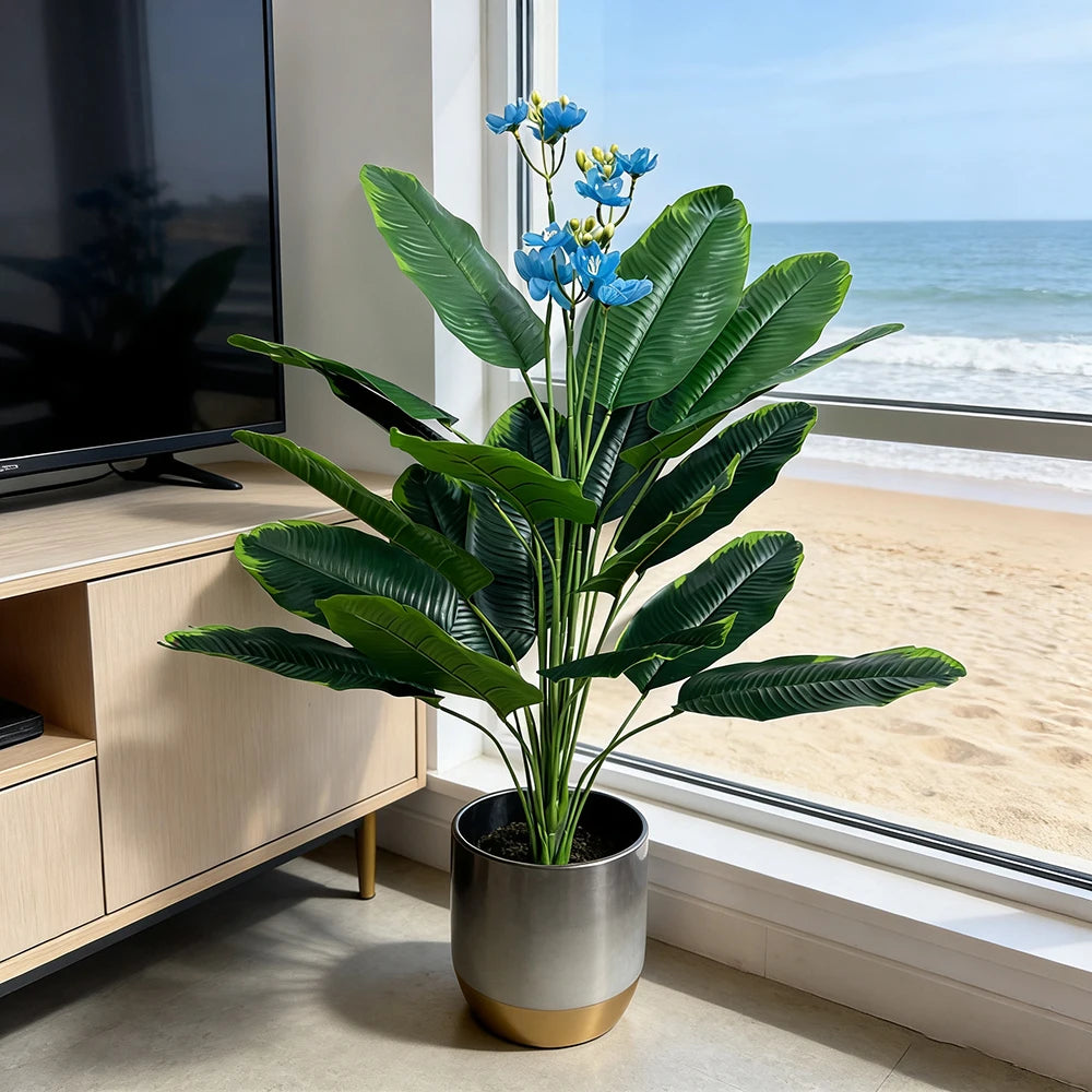 Artificial plant Albína beside a TV unit by a sunny window