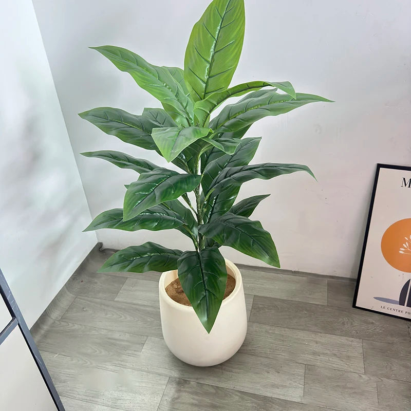 Artificial plant Andrea in a white pot in a bright room