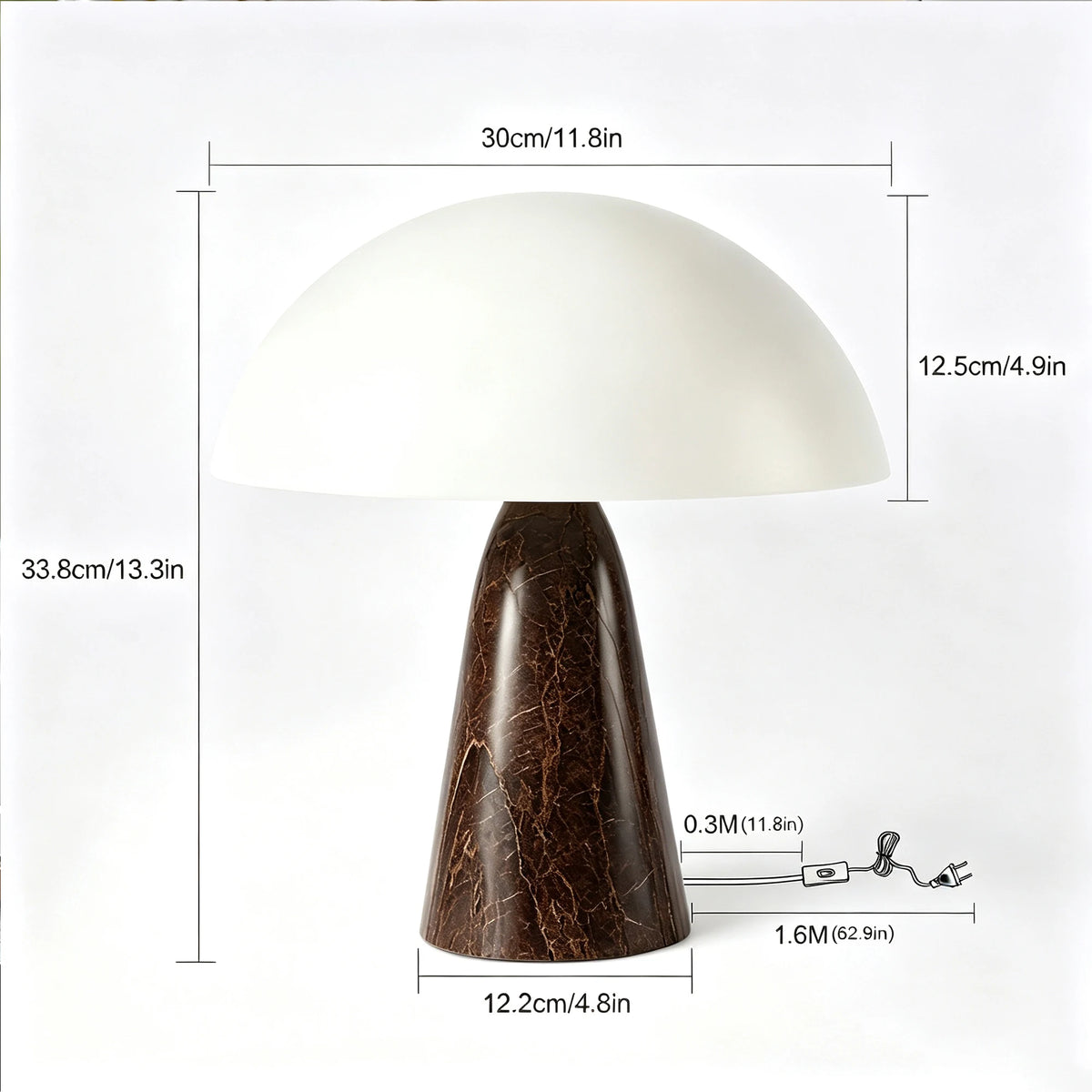 Table Lamp Boris in Espresso, dome shade lit against a dark ceramic base