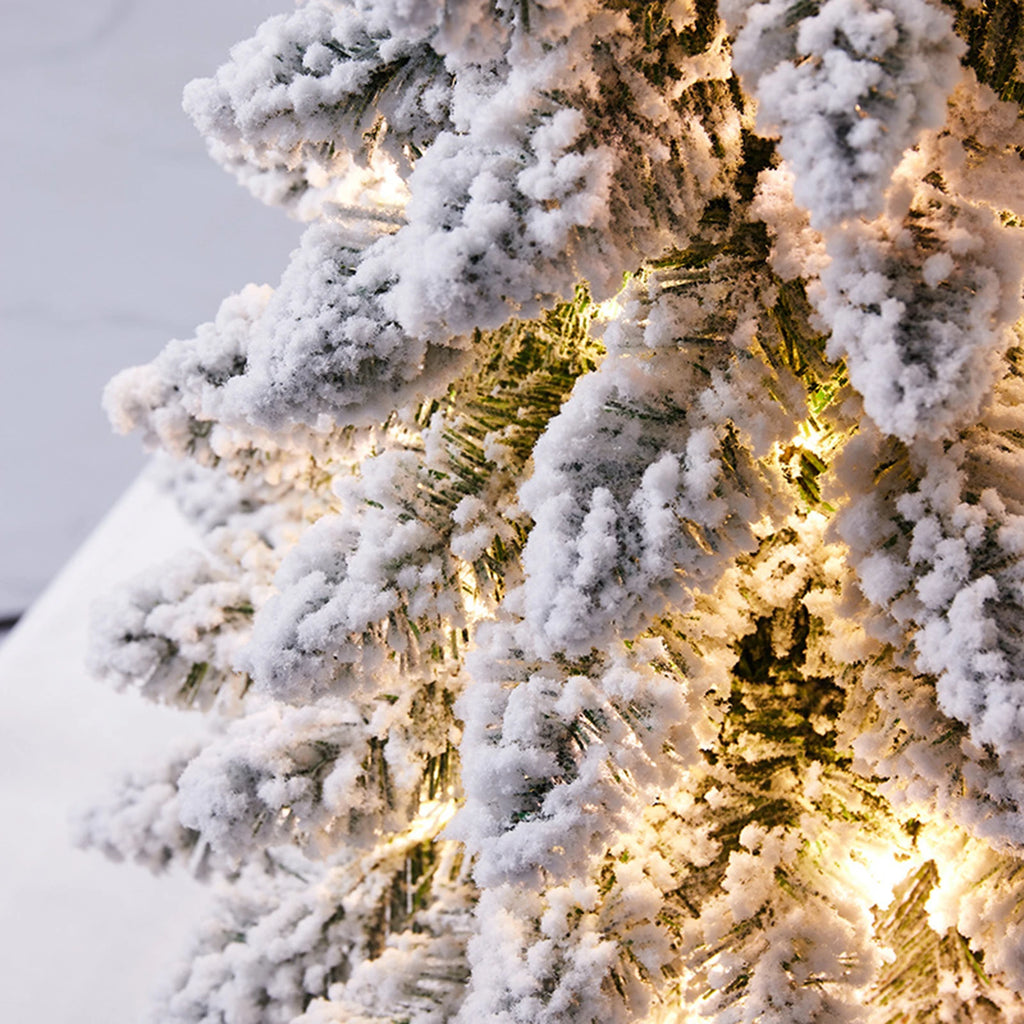 Tabletop Tree Janka – close-up of flocked branches with warm lights