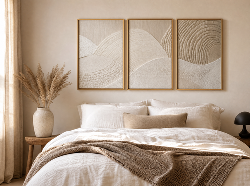 Canvas Wall Art Ivana three-panel textured set above a bed with linen bedding