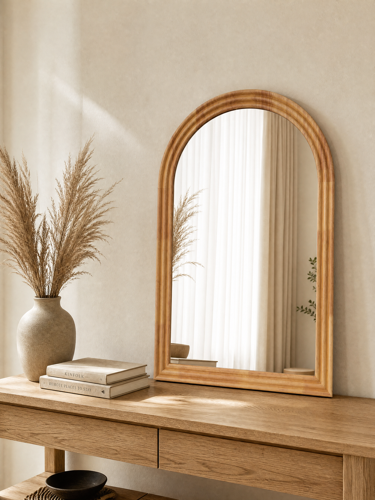 Mirror Michal in Natural light wood, arched frame on an entryway console