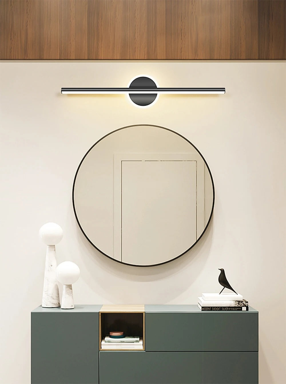 Vanity Light Erik above a round mirror and green vanity