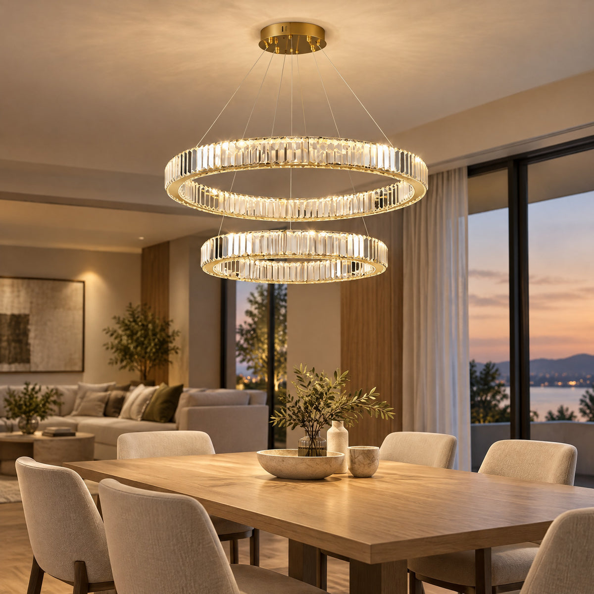 Chandelier Gabriela double crystal ring above a dining table