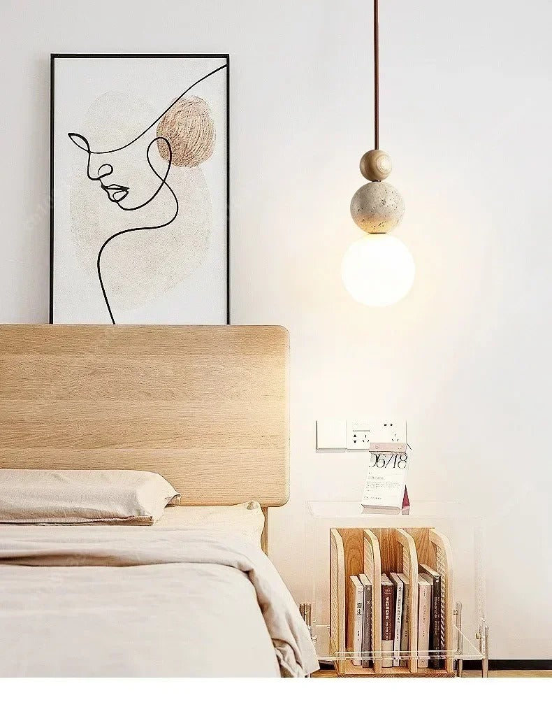Pendant Light Lenka hanging beside a bed as a bedside light