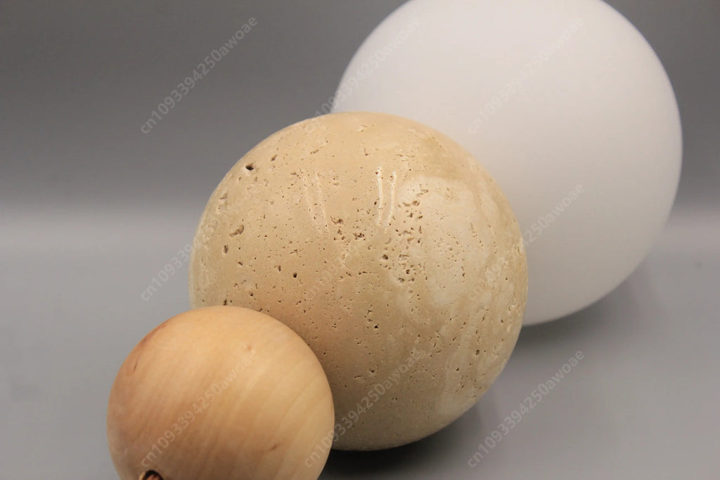 Close-up of the travertine and wood beads of Pendant Light Lenka