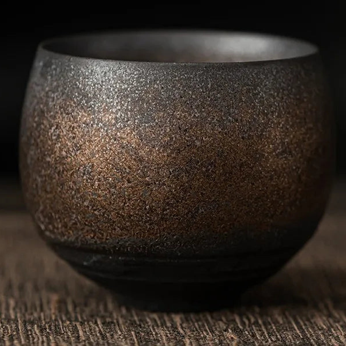 Tea Cup Mária in bronze, a cup with a dark rust-toned glaze