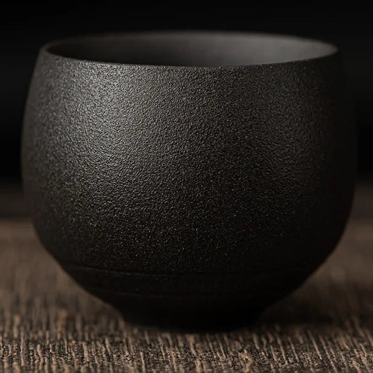 Tea Cup Mária in charcoal, a matte black round stoneware cup
