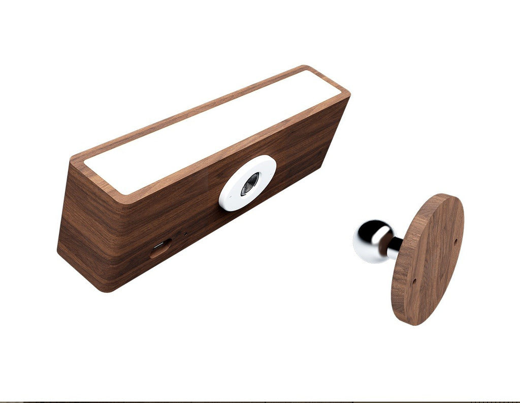 Wall Lamp Hugo in walnut on its magnetic base