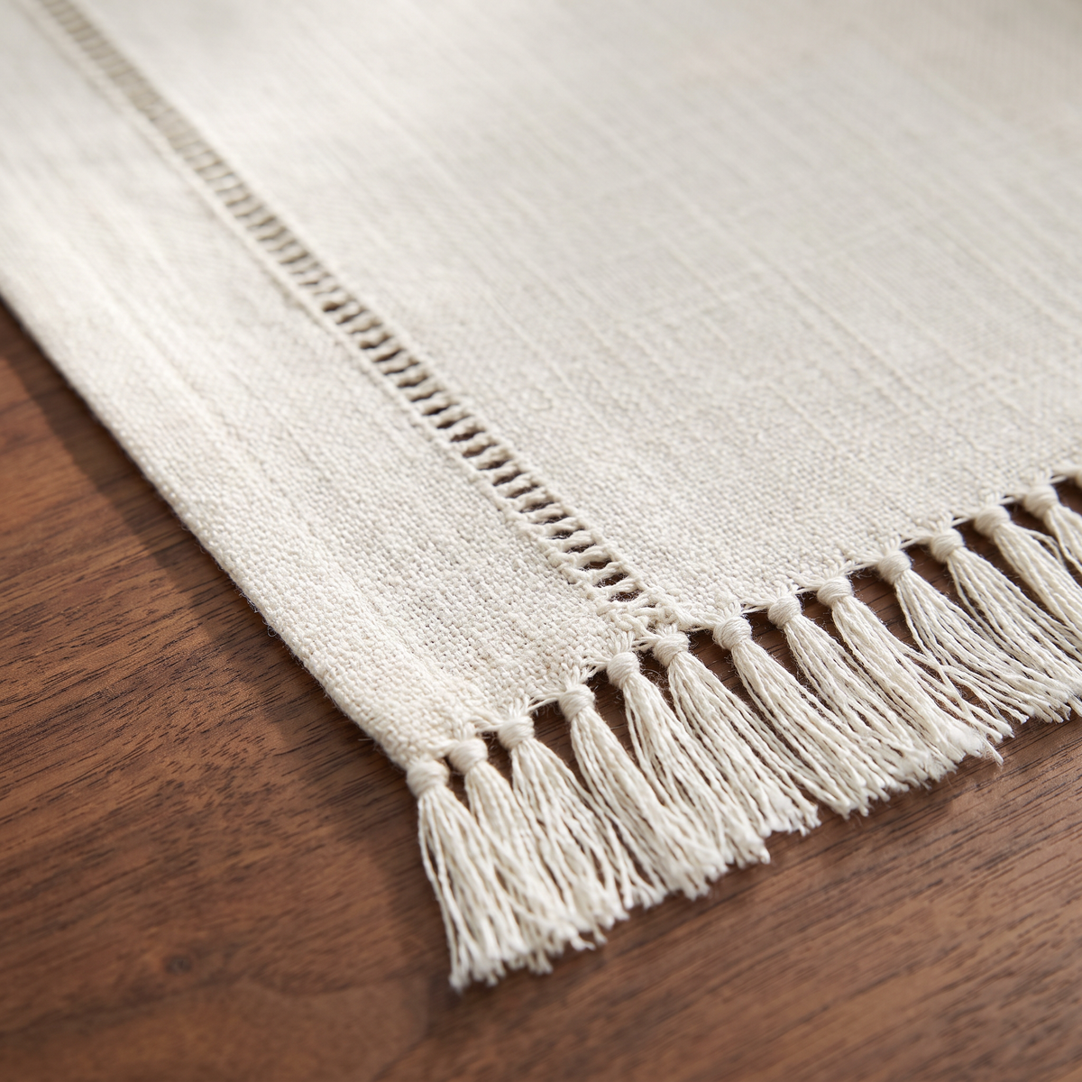 Close up of Lipa table runner hemstitch border and fringe detail