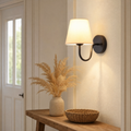 Wall Sconce Vladimír — single black sconce in entryway