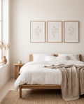 Lipa neutral abstract wall art print styled in a wood frame above a console table